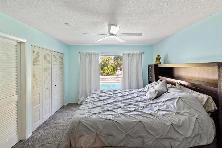 large master room with a pool view