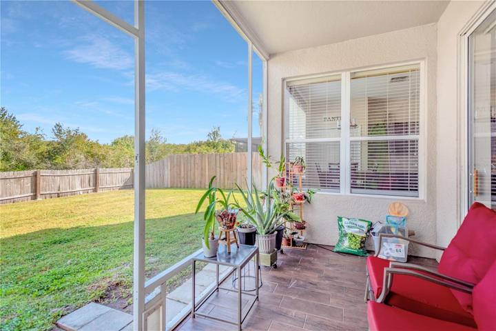 Screened in Patio overlooking fully fenced yard