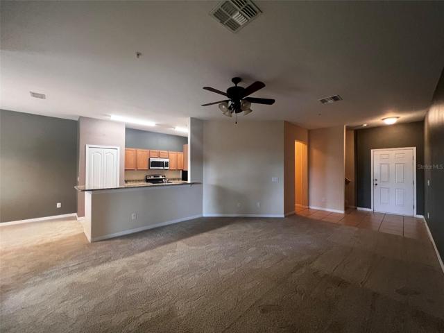 Large and open living room to the entryway