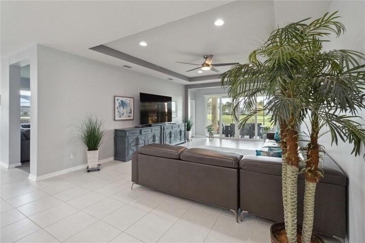 Beautiful tray ceilings adorn this living space