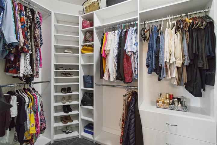 Custom designed closet system with drawers and shelves