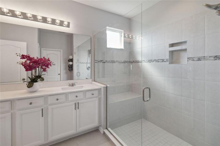 Oversized shower with built in sitting area