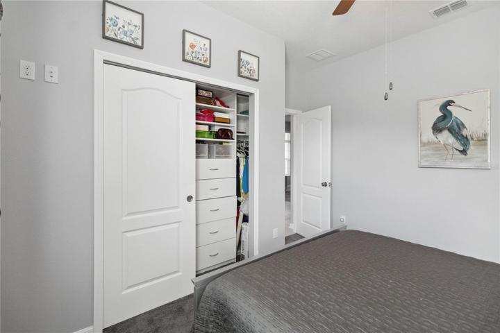Guest bedroom with custom built-in closet