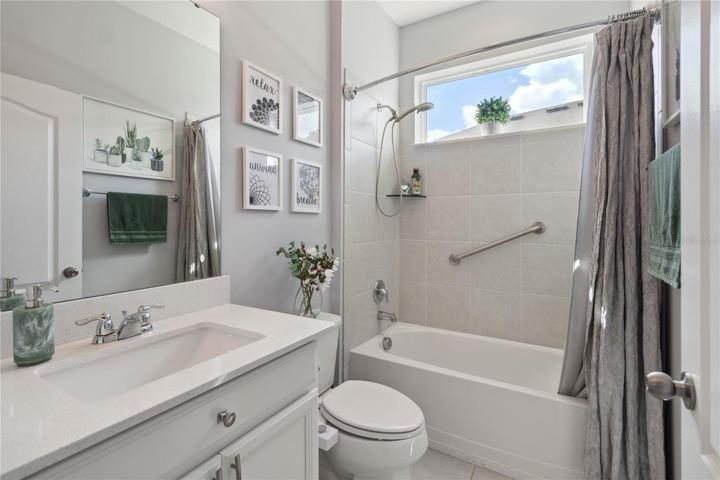Gorgeous guest bathroom with a large window