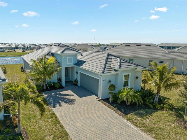 Front of home with tile roof