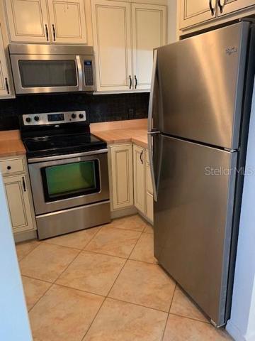 kitchen has stainless steel appliances