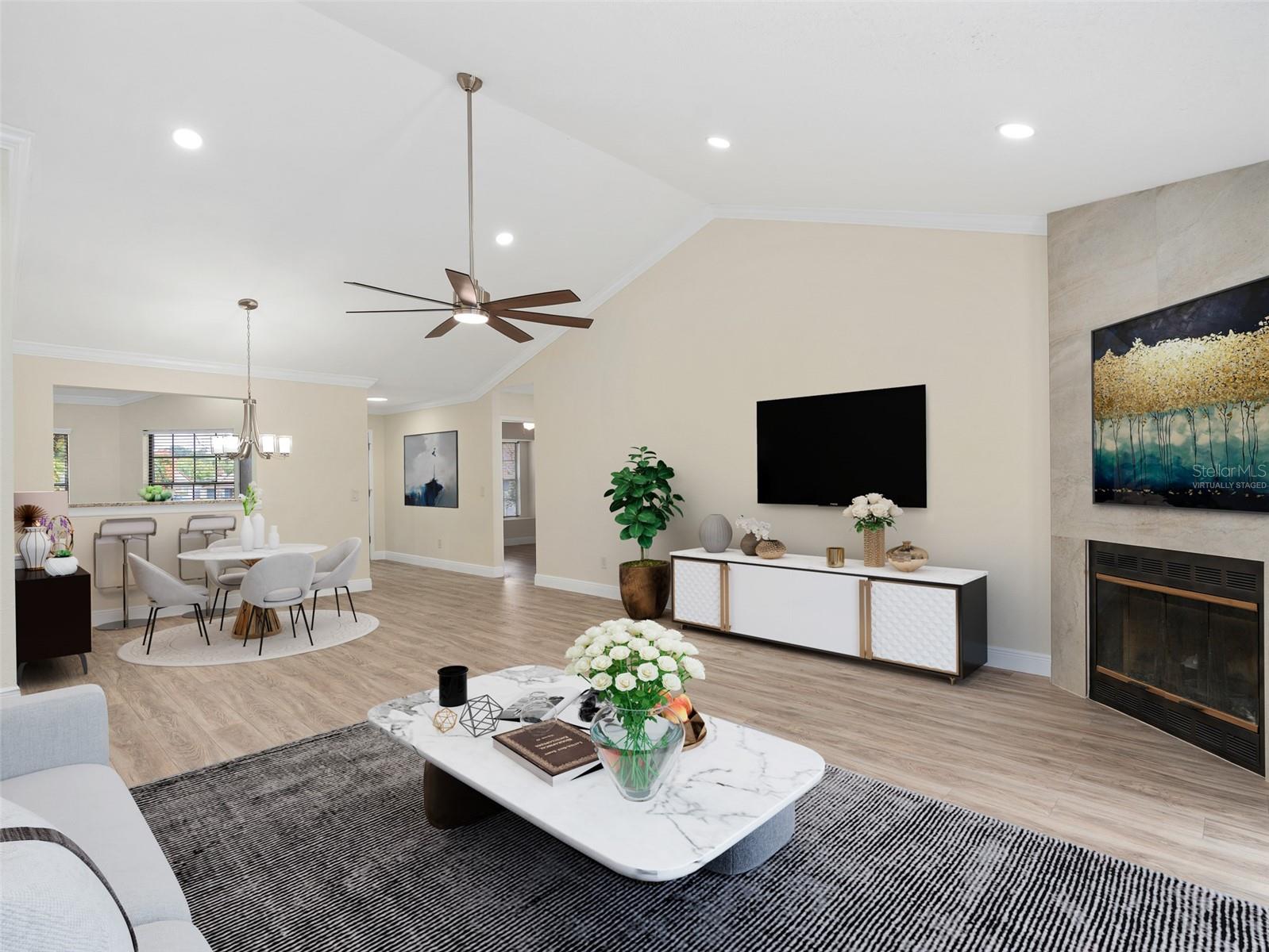 VIRTUALLY STAGED  great room with view of dining area