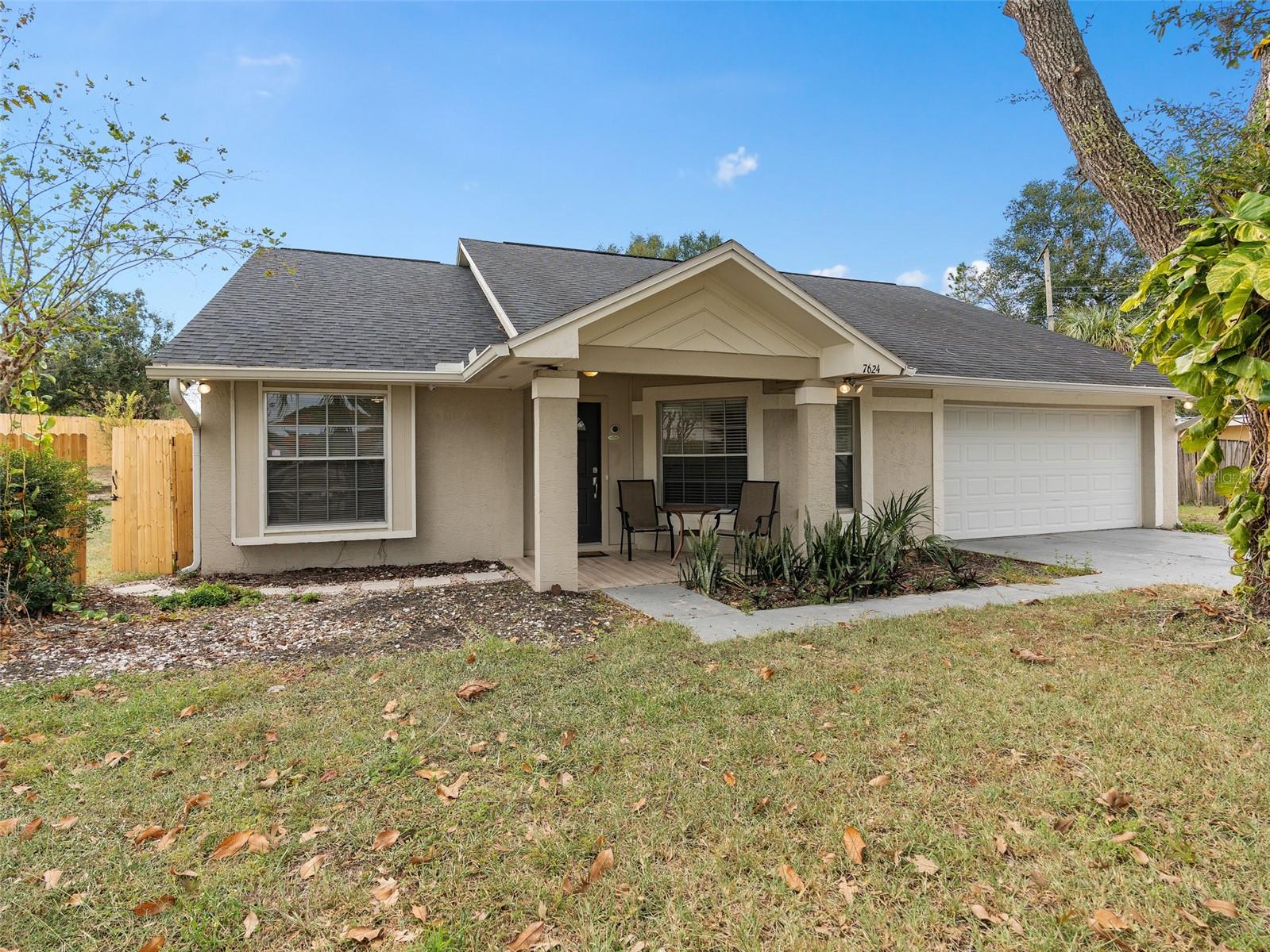 front elevation showing newly fenced in backyard
