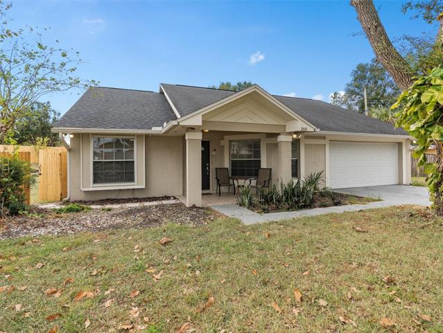 front elevation showing newly fenced in backyard