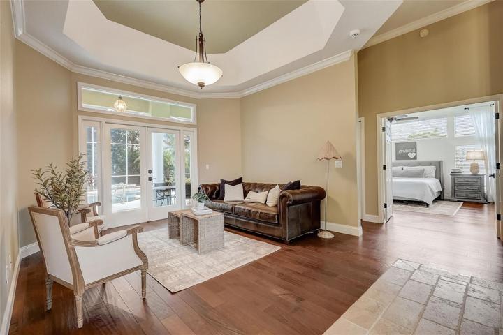 Grand foyer with travertine tile floors