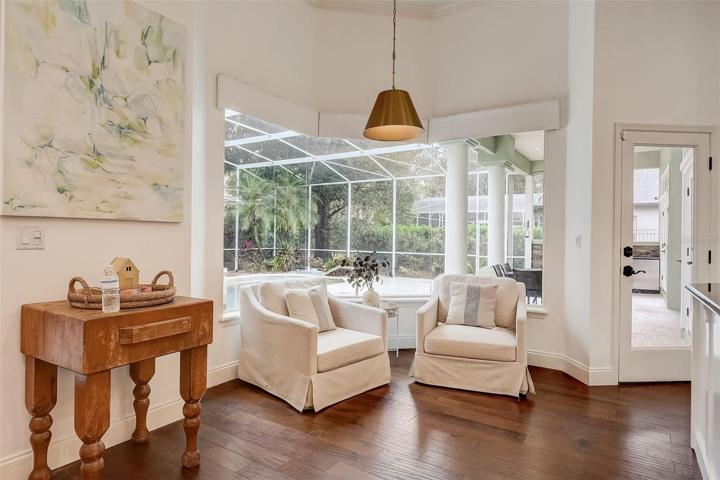 Huge & beautiful picture window in the kitchen nook, use this as your breakfast area or it makes the coziest reading corner with all the natural light!