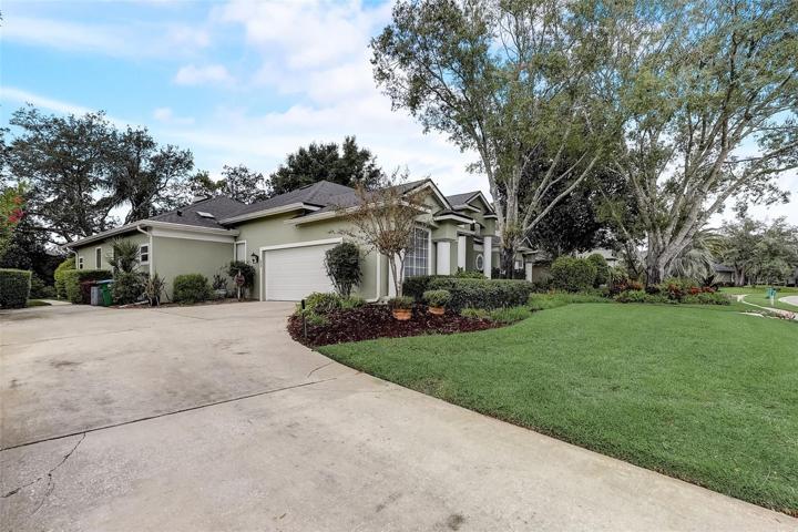 Side entry 2 car garage with an oversized driveway