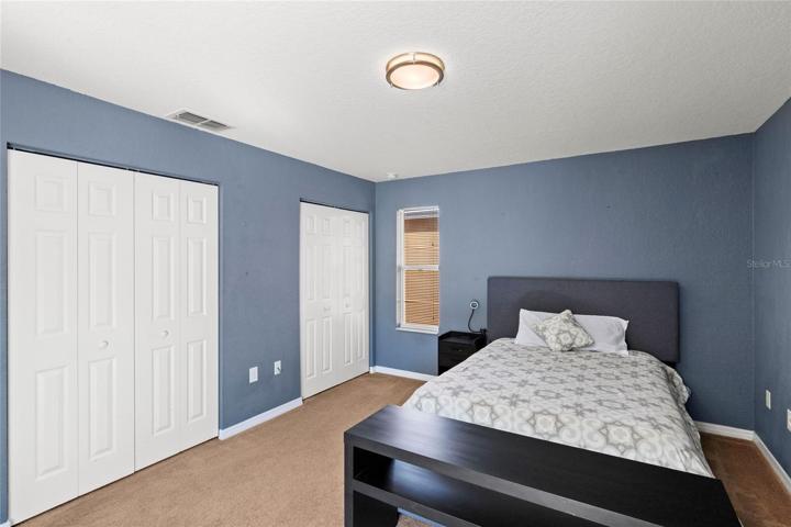 Third Bedroom with Sliding Glass Doors to Back Patio