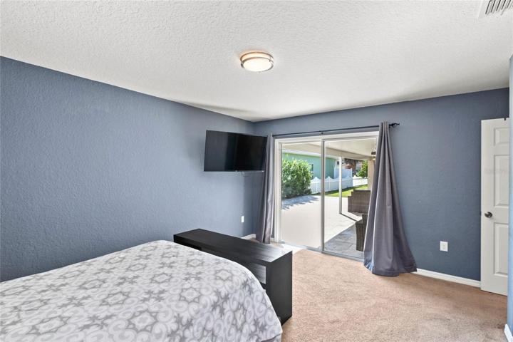 Third Bedroom with Sliding Glass Doors to Back Patio
