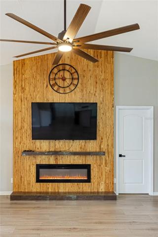 Hand crafted Eucalyptus wall with fireplace