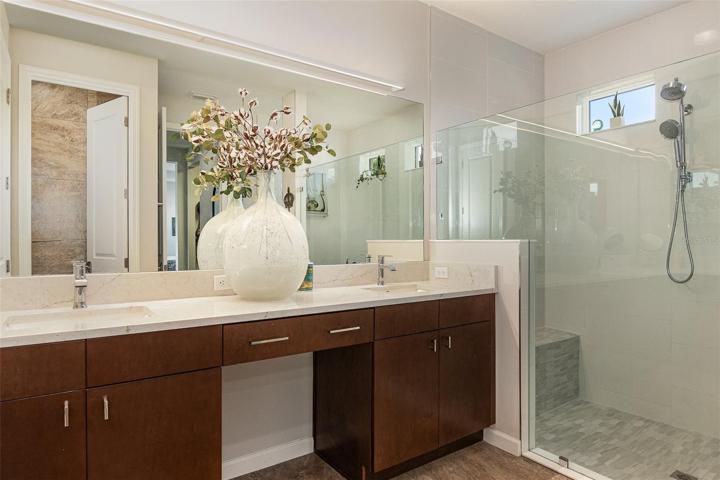 Master Bathroom - Quartz Counters, floor-to-ceiling shower tiling