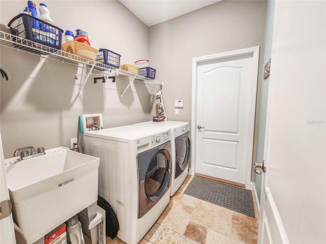 Indoor Laundry room offers a wash basin