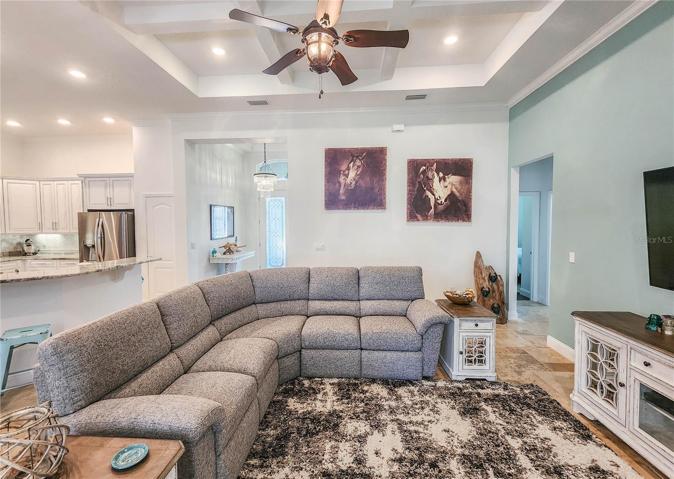 Coffered ceiling and plenty of natural light in the Great Room