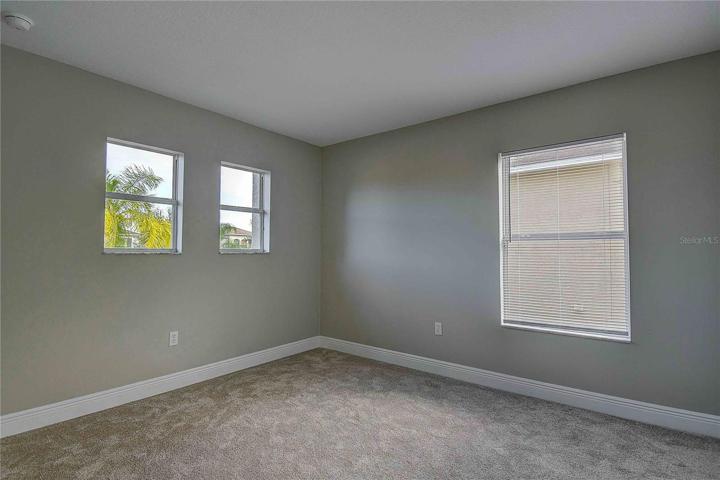 Third bedroom, with dimensions approx 12' x 10.5'.
