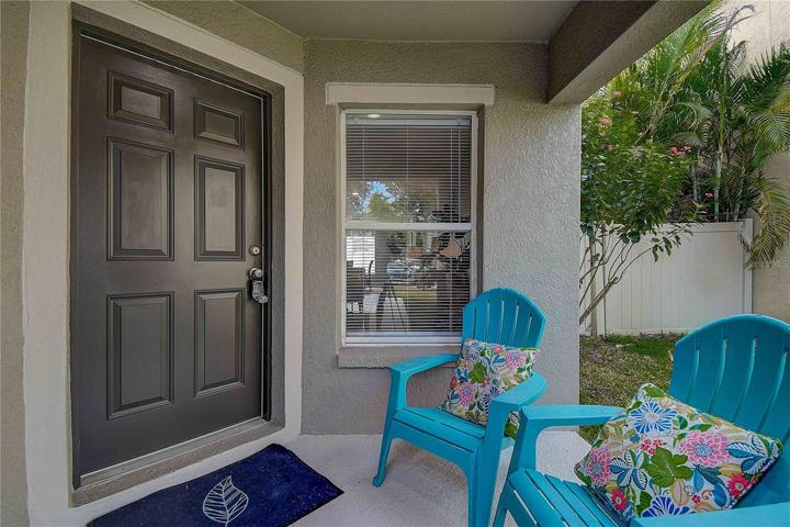 Welcome guests at your inviting covered foyer entry.