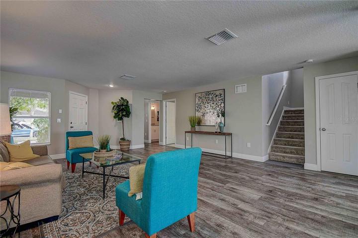 Ideal open floor plan with newly installed laminate flooring throughout main living areas.