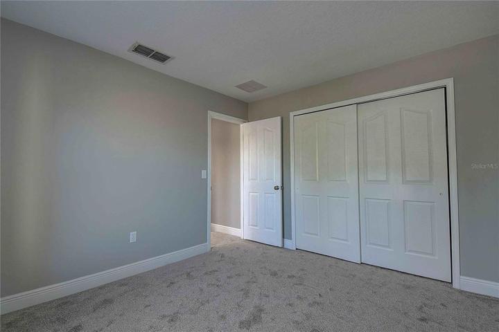 Second bedroom, with dimensions approx 11.5' x 10.5'.
