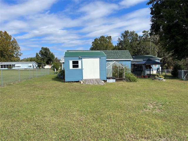 Two detached shed in backyard