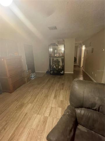 Entry Foyer with Hallway to Bedrooms and Kitchen