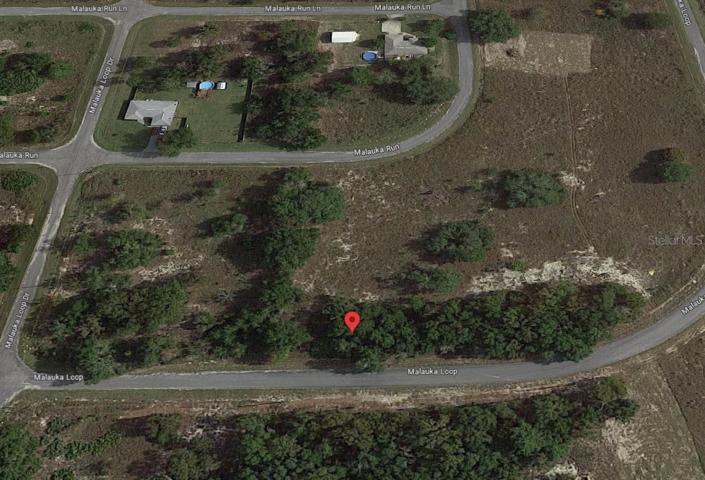 Aerial view looking east towards the property