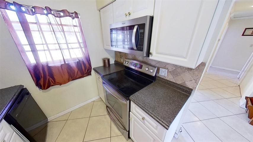 Kitchen (range and window)