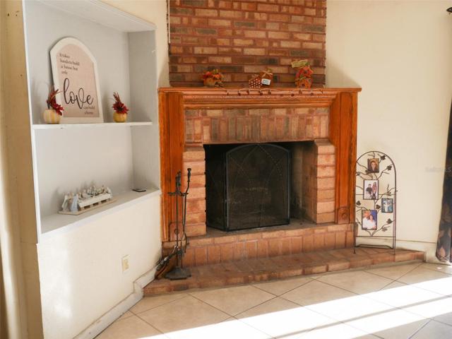 BRICK FIREPLACE is extra cozy