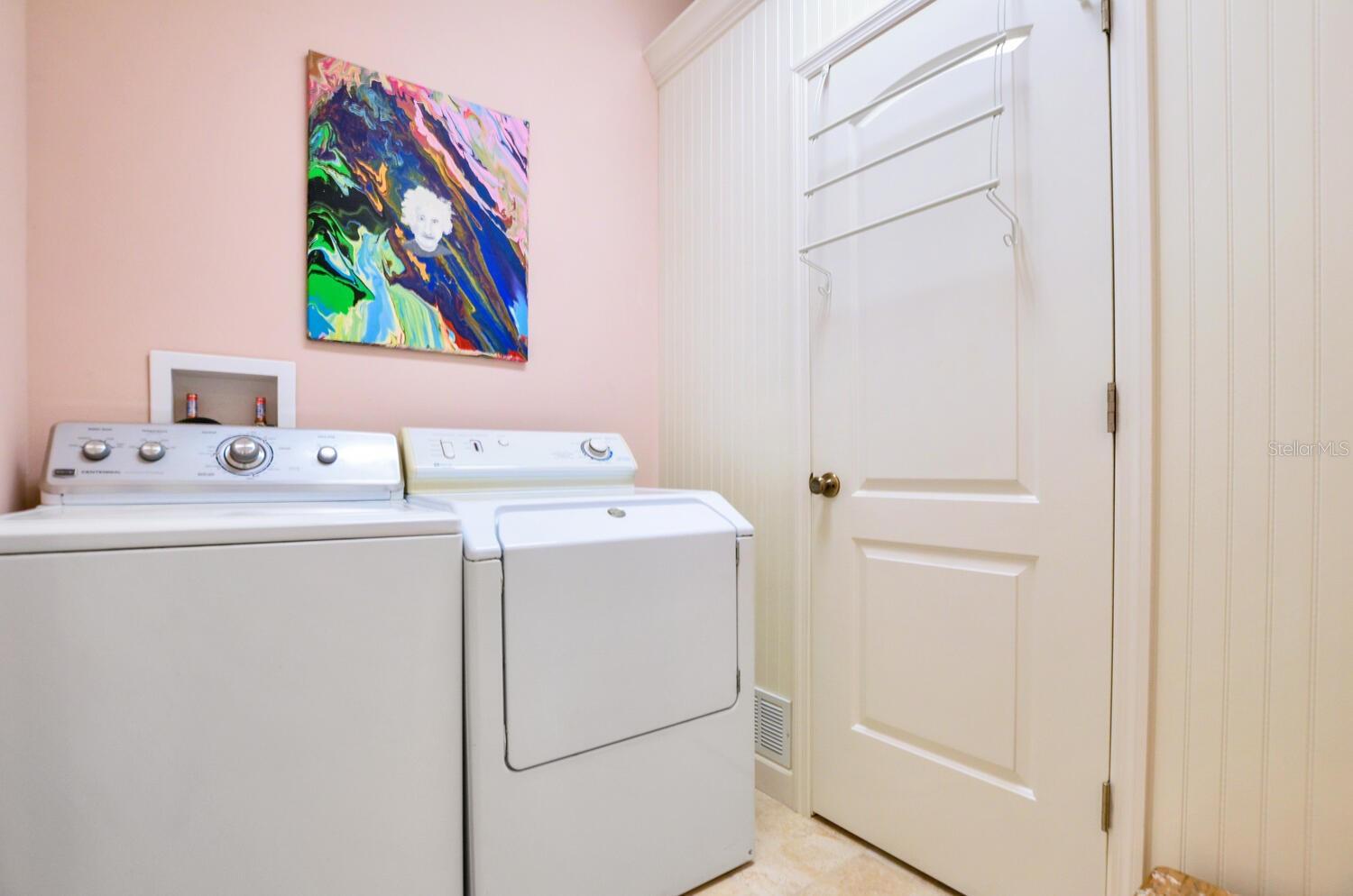 laundry room w/ large storage closet
