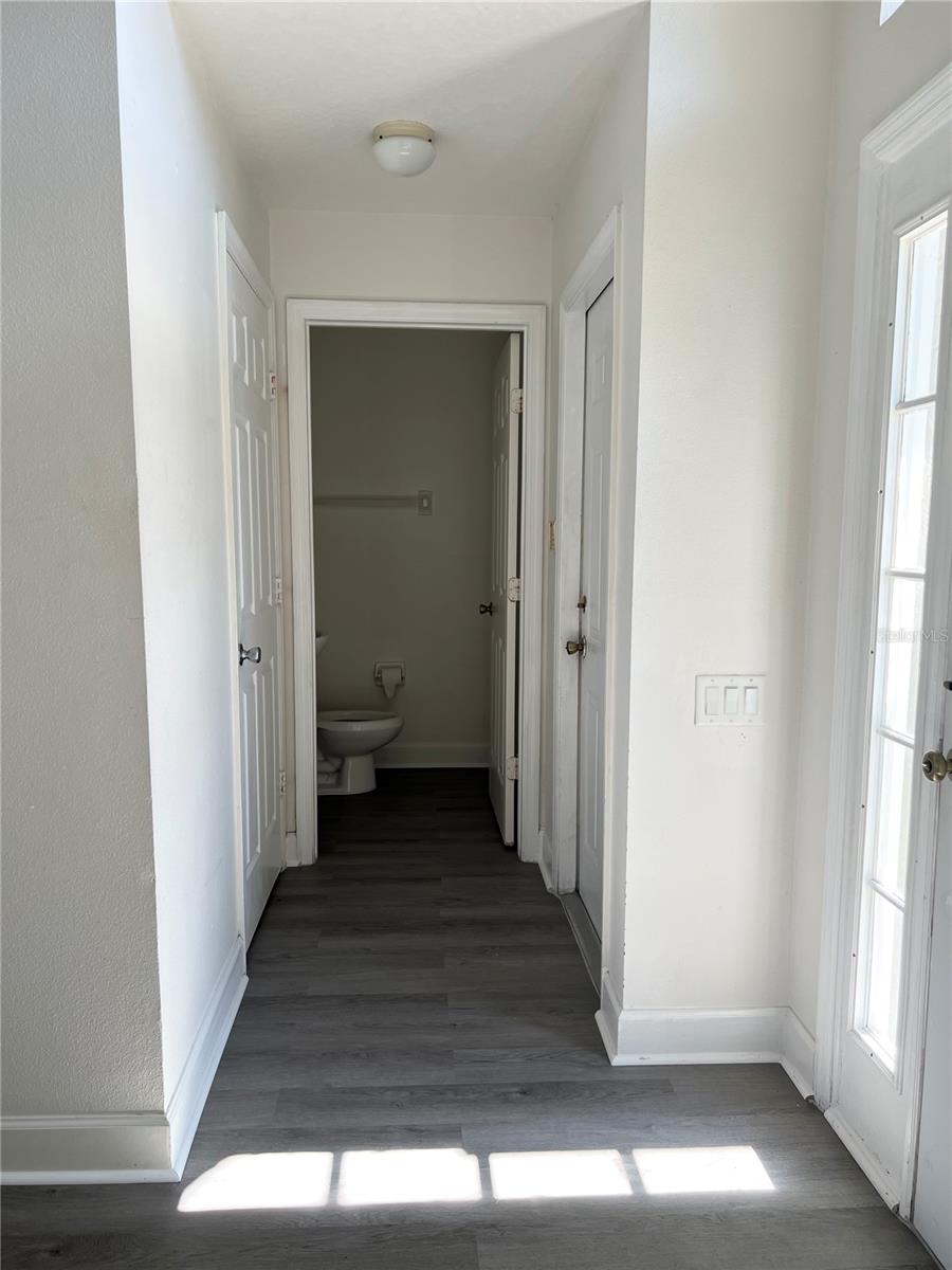 right to entrance is laundry room, half bath and door to garage