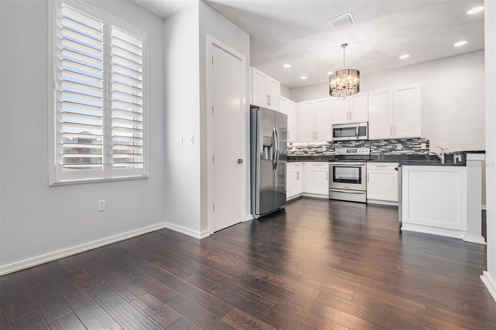 Second Floor - Family Room, Kitchen, Dining, Guest Bath and Laundry