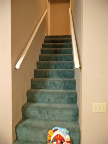 Unit 2 Stairway to 1/2 bath and Loft Bedroom