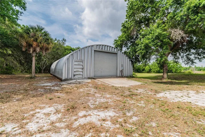 Detached 40'x60'X18'  garage with 2 car lift's  plus electric & water already hooked up!!