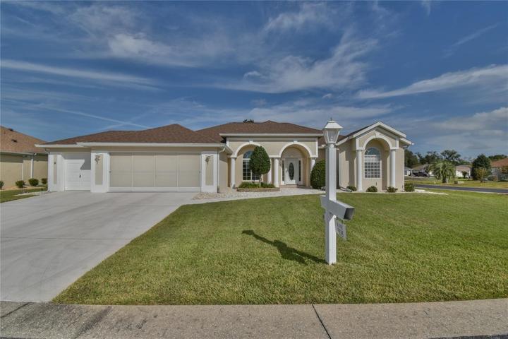 Front of House, Golf Course and Corner Lot with Golf Cart Garage