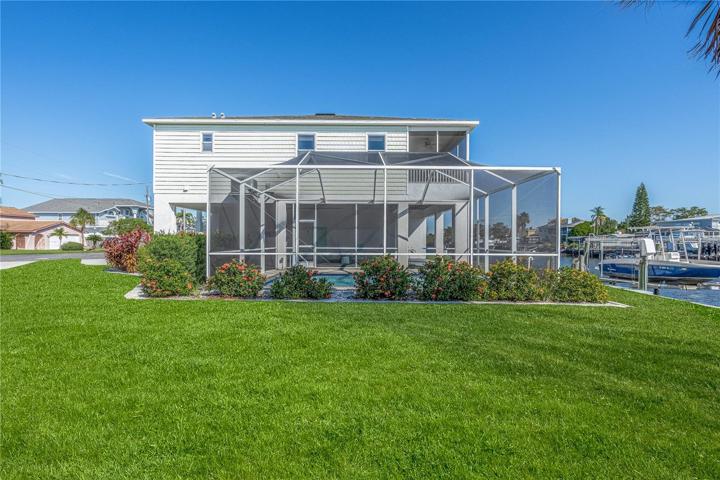 View of pool and home
