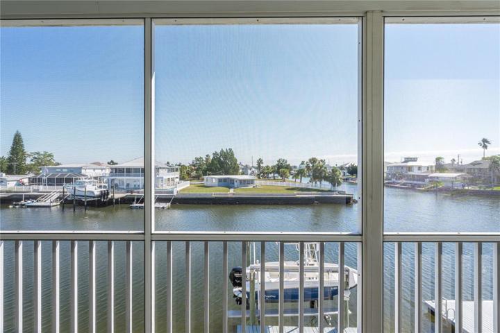 Screened in Balcony overlooking canal