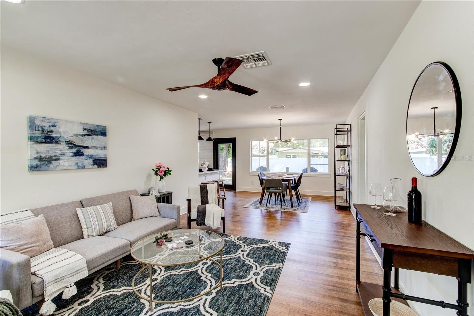 Living room looking into dining area.