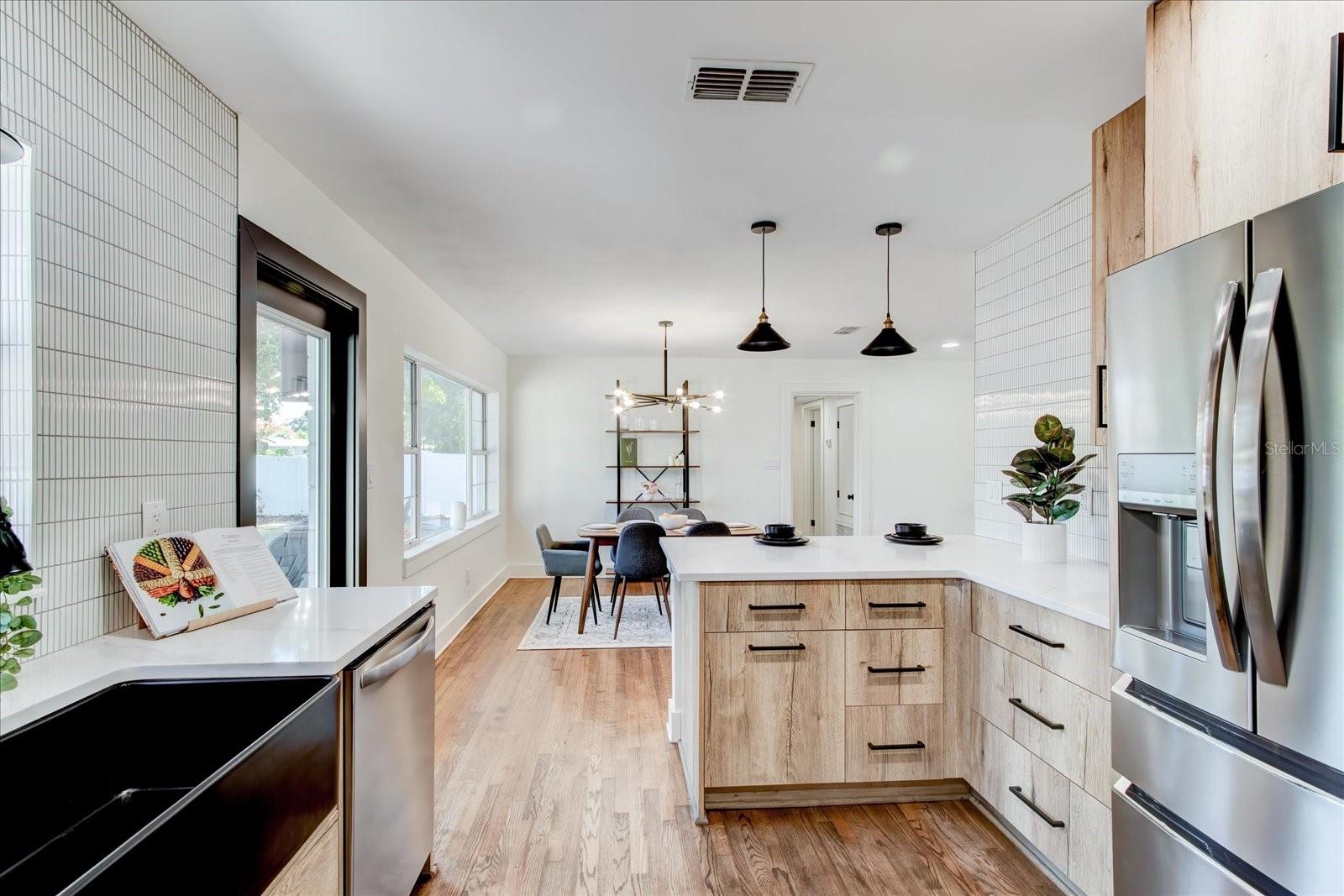 Designer kitchen looking into dining room.