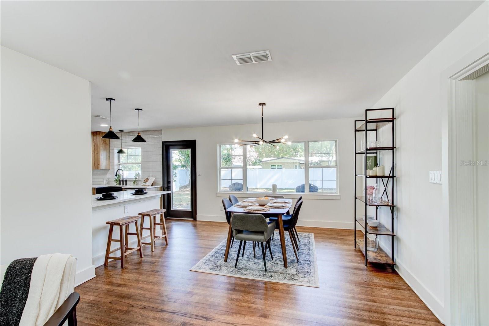 Large dining area with eat in bar.