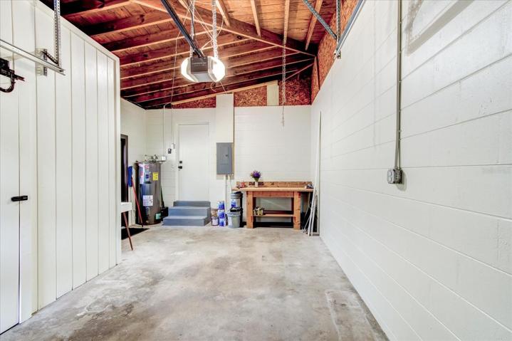 Garage with new garage door and opener.