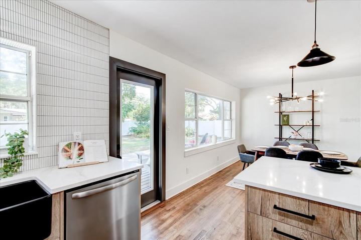 Kitchen that opens out to outdoor living space.