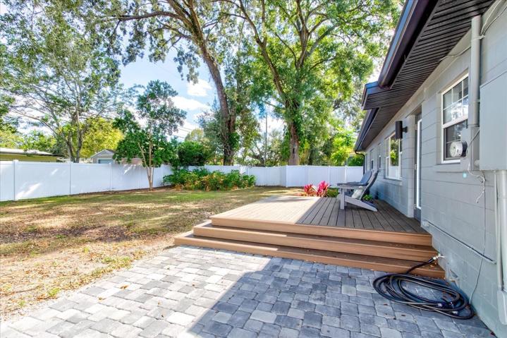 Paver deck area by Trex deck great for entertaining.