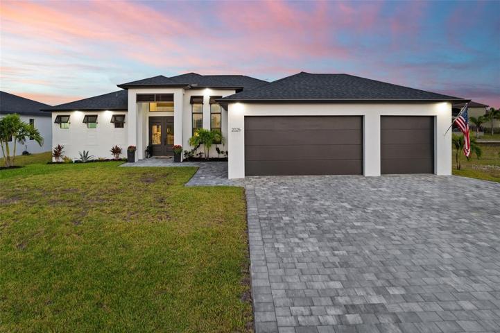 Twilight view of the front of the house