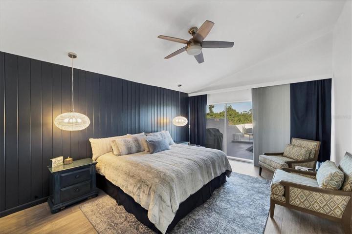 Master Bedroom has views of the pool with access through the sliding doors.