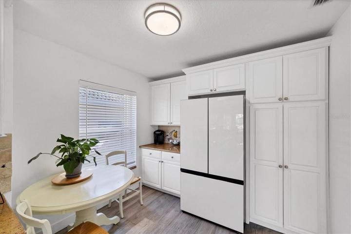 Eat in kitchen with dinette - NEW Fridge with french doors and beverage center - Plenty of cabinetry too!