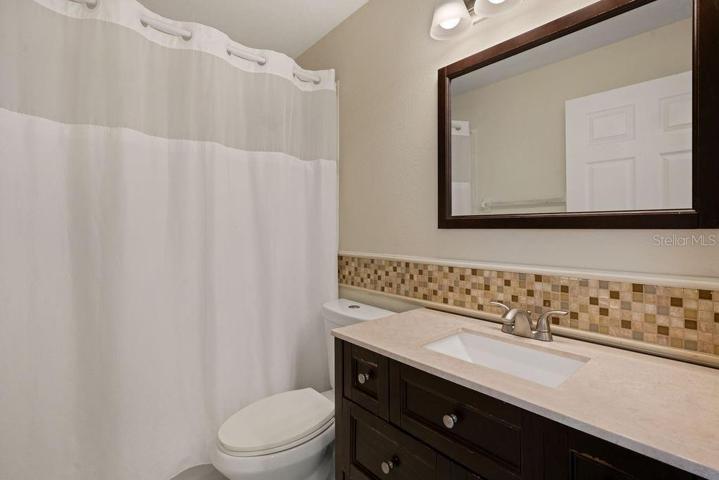 Guest Bathroom with Tub/Shower combination.