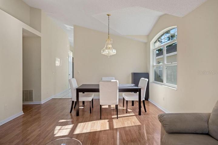 Dining area with chandelier.